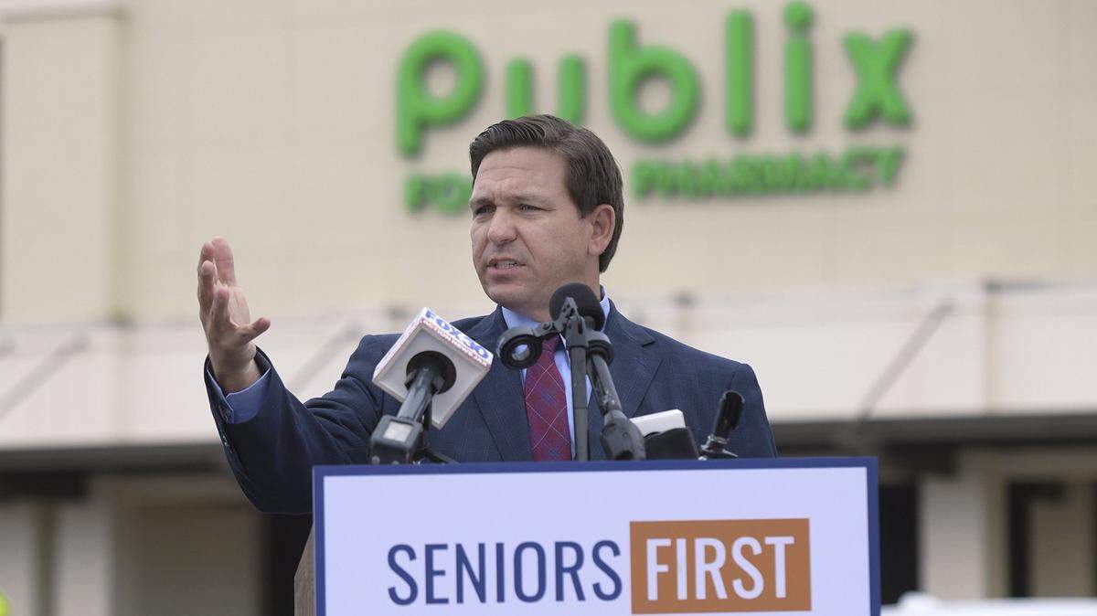 Florida Governor Ron DeSantis speaks at a press conference at a Publix Super Market in Ponte Vedra Beach, Fla, Wednesday, Jan. 13, 2021. DeSantis announced the expansion of the use of Publix pharmacies as COVID-19 vaccination sites to 56 new stores in St. Johns, Flagler, Volusia and Collier counties. (Bob Self/The Florida Times-Union via AP)