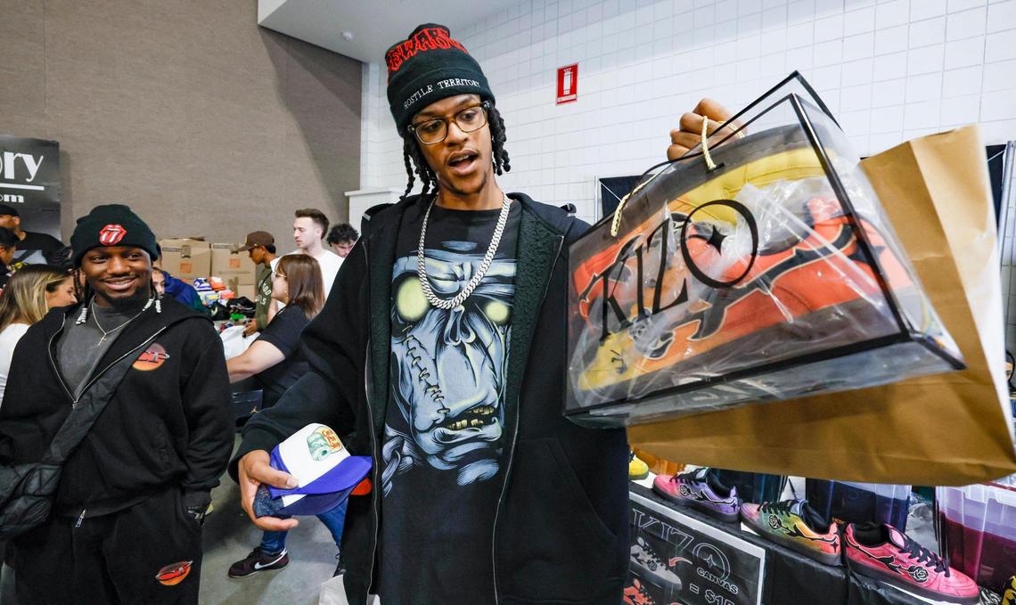 Shareef O’Neal, son of former Miami Heat basketball player Shaquille O’Neal, shows off freshly dyed KIZO shoes at Sneaker Con at the Broward County Convention Center in Fort Lauderdale, Florida, on Saturday, Jan. 11, 2025.