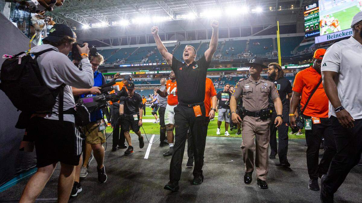 University of Miami Head Coach Mario Cristobal reacts after defeating Clemson 28-20 in double overtime during an ACC college football game at Hard Rock Stadium in Miami Gardens, Florida, on Saturday, October 21, 2023.