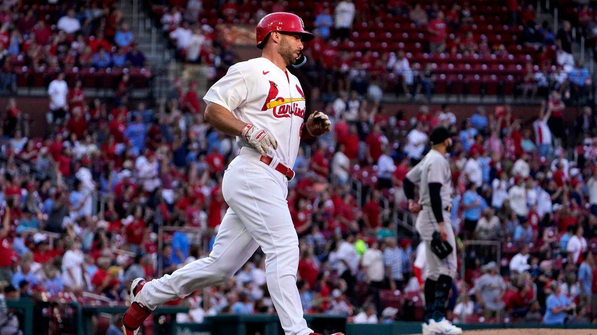 St. Louis Cardinals’ Paul Goldschmidt rounds the bases after hitting a solo home run off Miami Marlins starting pitcher Pablo Lopez, right, during the first inning of a baseball game Monday, June 27, 2022, in St. Louis.