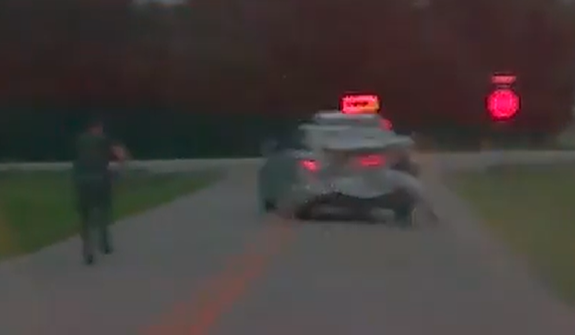 One deputy was seen jumping out from in front of the suspect’s car as it sped away.
