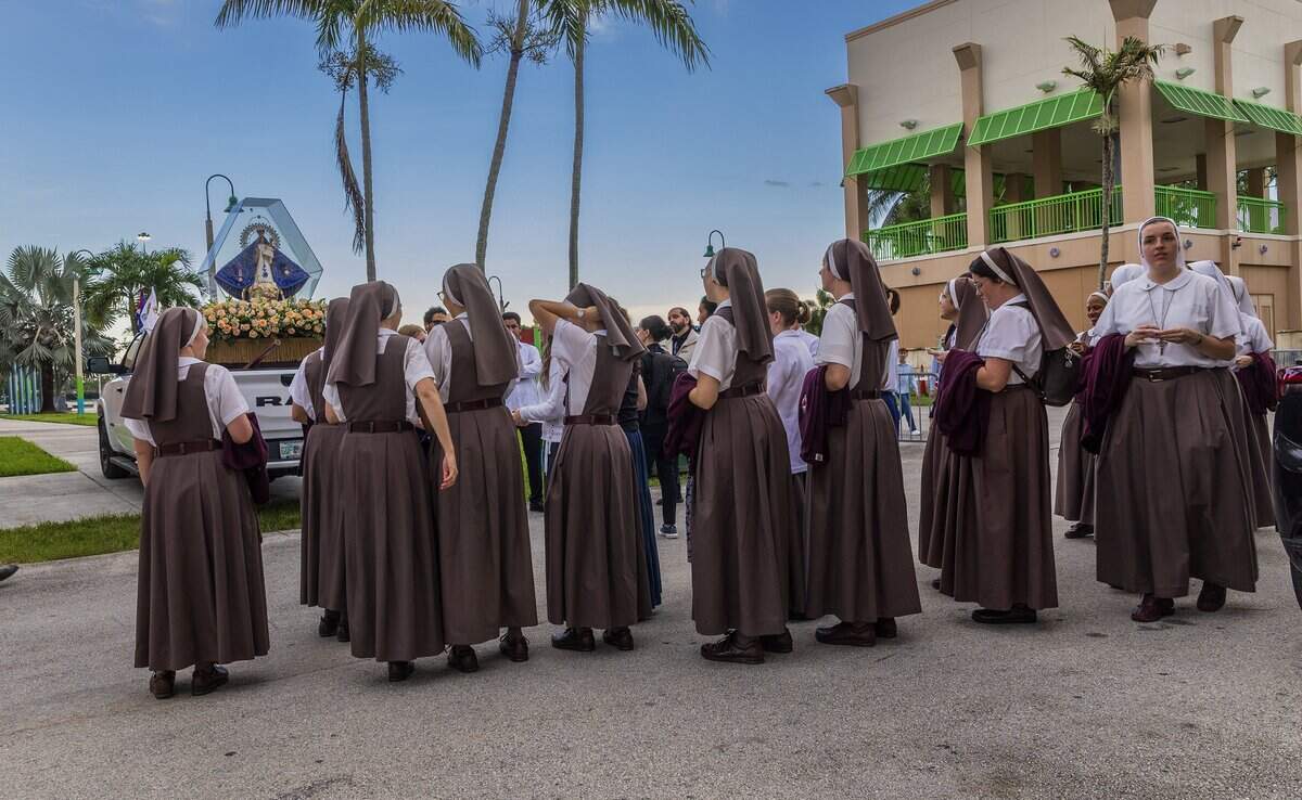 A group of sisters with the Pierced Hearts of Jesus and Mary welcomed a vehicle procession with the blessed statue of Our Lady of Charity ahead of the celebration of a Solemn Mass celebrating the 65th Anniversary of the Arrival of the Image of Our Lady of Charity in Miami, presided over by Reverend Thomas Wenski, Archbishop of Miami celebrated at the Miami-Dade Fair & Exposition, in West Miami, on Tuesday September 08, 2026.