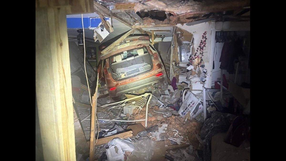 The Hyundai Santa Fe entered from the backyard, injuring two women inside the home, the Florida Highway Patrol reports.