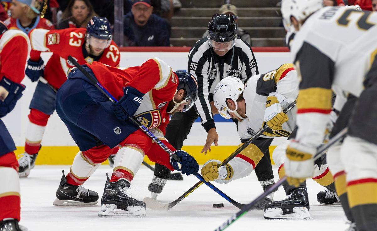 Florida Panthers center Aleksander Barkov (16) and Vegas Golden Knights center Jack Eichel (9) face off in the first period of Game 3 of the NHL Stanley Cup Final at the FLA Live Arena on Thursday, June 8, 2023, in Sunrise, Fla.