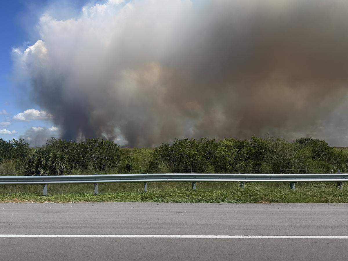 Smoke from the fire off Interstate 75 in western Broward County.