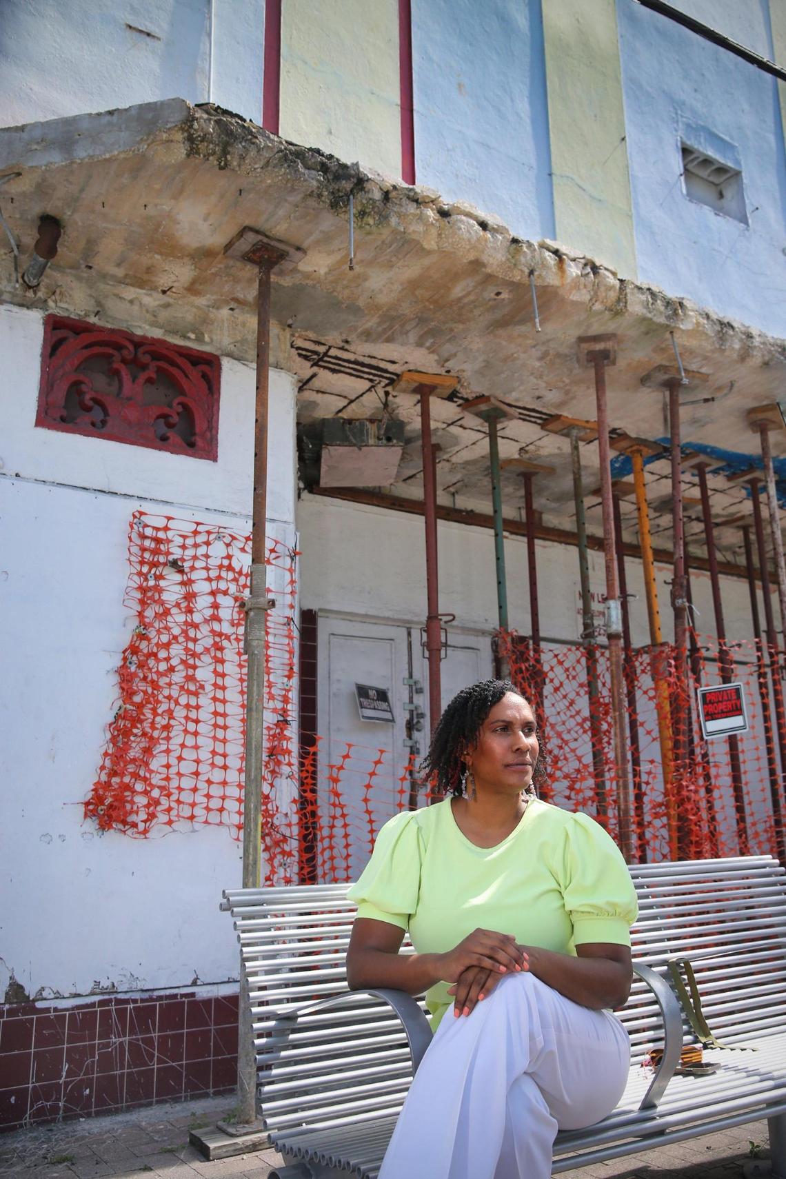Shanté Haymore-Kearney, a Coconut Grove native and resident, sits outside the historic but shuttered ACE Theater, a Jim Crow-era Art Deco movie house which her family owns in the neighborhood’s historically Black section. The ACE Theater Foundation is raising funds to restore and reopen the landmark 1930s theater.