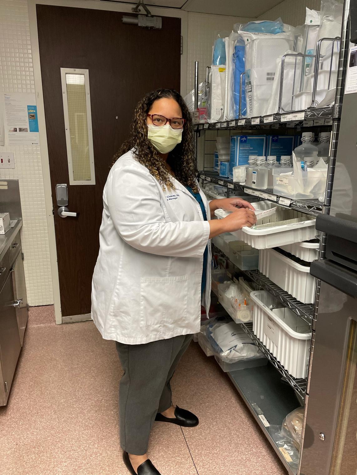  Rachel Chavez, RN, a nurse manager at Broward Health Imperial Point, checks medical supplies to ensure they have what they need to care for patients.
