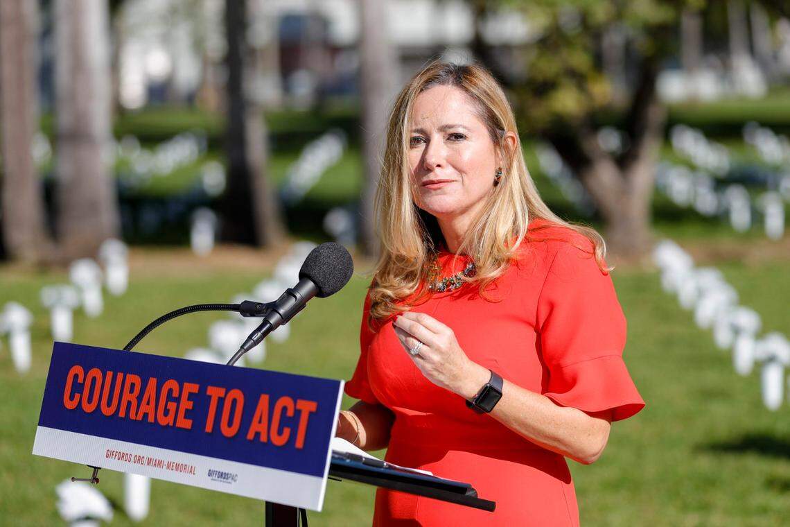 Former U.S. Rep. Debbie Mucarsel-Powell speaks at the unveiling ceremony of the Gun Violence Memorial Installation by Giffords Pac at Bayfront Park in downtown Miami on Monday, Dec. 13, 2021. The memorial features 3,000 vases, one for every Floridian who died from gun violence last year. During the event, Giffords PAC endorsed Orlando Congresswoman Val Demings for U.S. Senate.