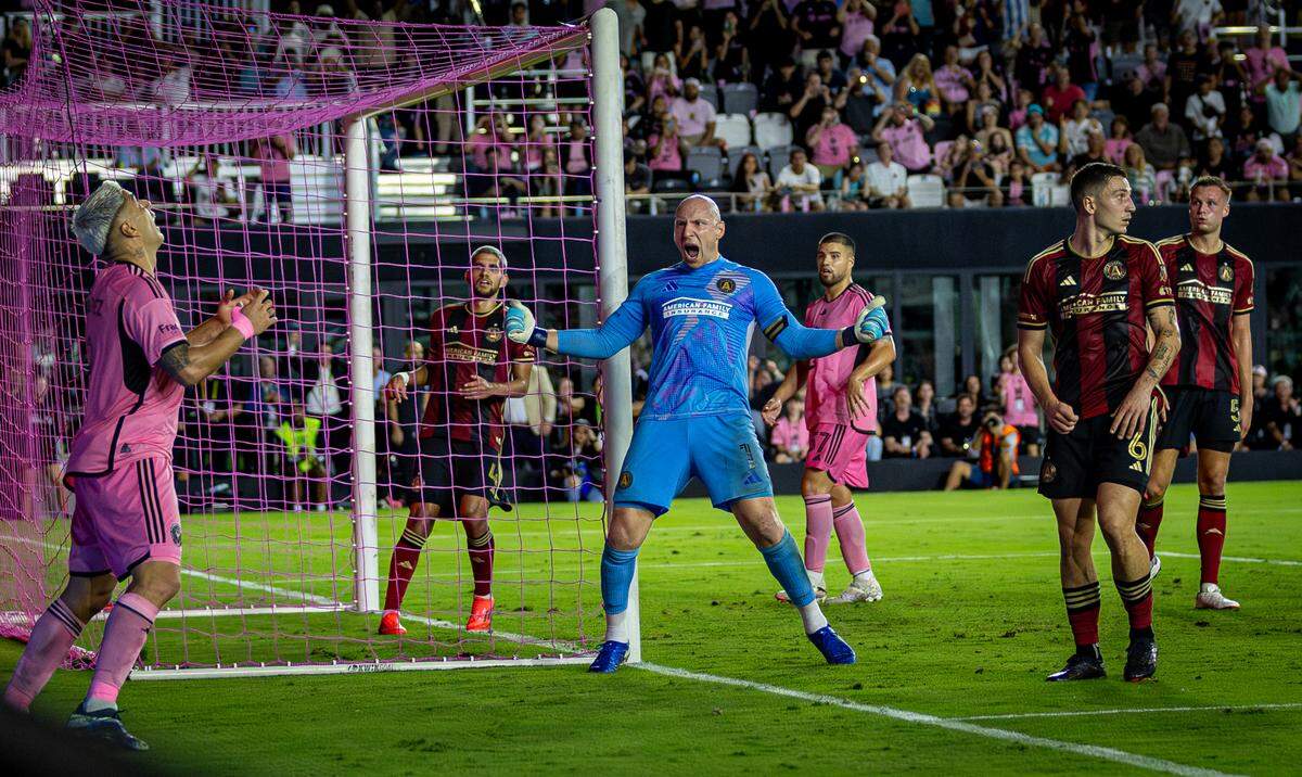 Atlanta United goalkeeper Brad Guzan (1) reacts after blocking a shot by Inter Miami forward Luis Suárez (9) in the second half of match three of their MLS Playoffs series at Chase Stadium on Saturday, Nov. 9, 2024, in Fort Lauderdale, Fla