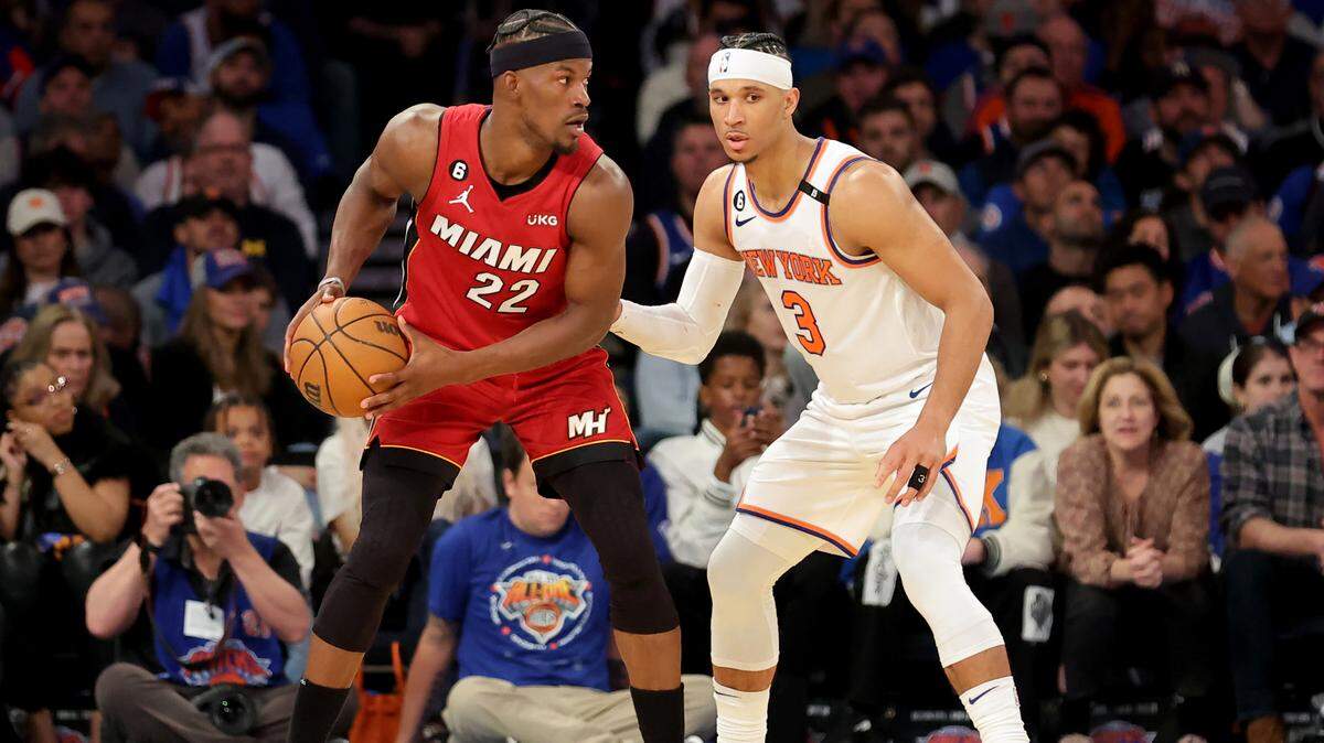 Miami Heat forward Jimmy Butler (22) controls the ball against New York Knicks guard Josh Hart (3) during the fourth quarter of game one of the 2023 NBA Eastern Conference semifinal playoffs at Madison Square Garden.