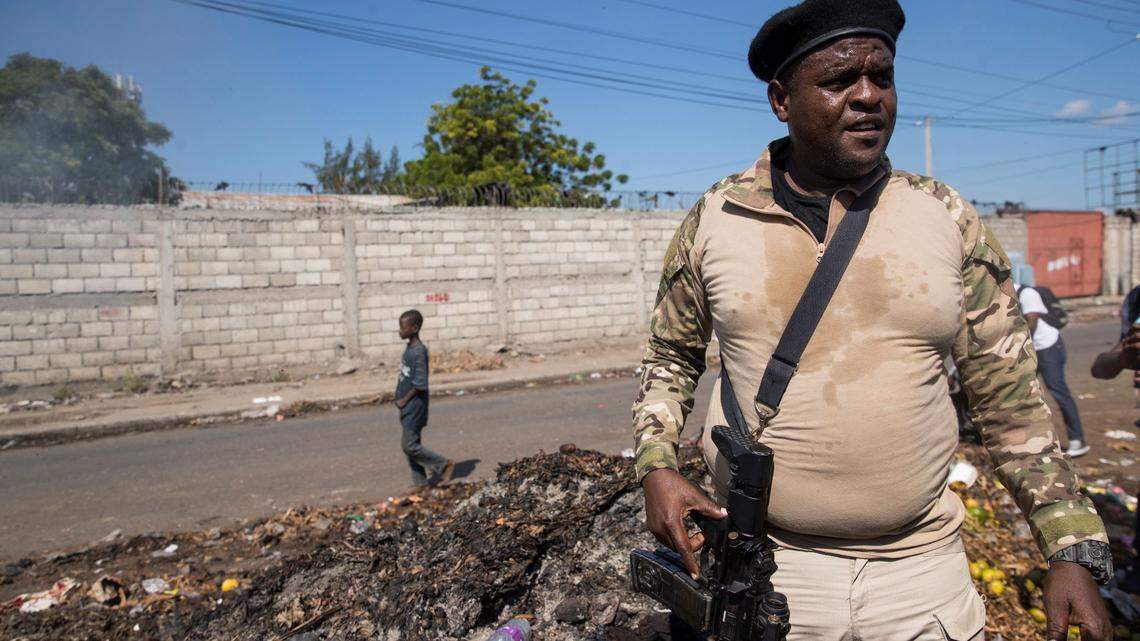 The leader of Haiti’s main armed gang, Jimmy Cherizier, alias Barbecue, speaks to the media during a tour of the La Saline neighborhood, in Port-au-Prince, Haiti, 03 November 2021. Barbecue, kingpin of the group called G9 Fanmi e Alye, summoned the national and international press in the impoverished neighborhood of La Saline and read a statement charging against the Government and calling for the resignation of Prime Minister Ariel Henry. Criminal groups, mainly G9 Fanmi and Alye, have been spreading terror for months, with the exception of two brief truces after the assassination of President Jovenel Moise on 07 July and the earthquake that struck the south of the country on 04 August. EFE/ Orlando Barria/Sipa USA