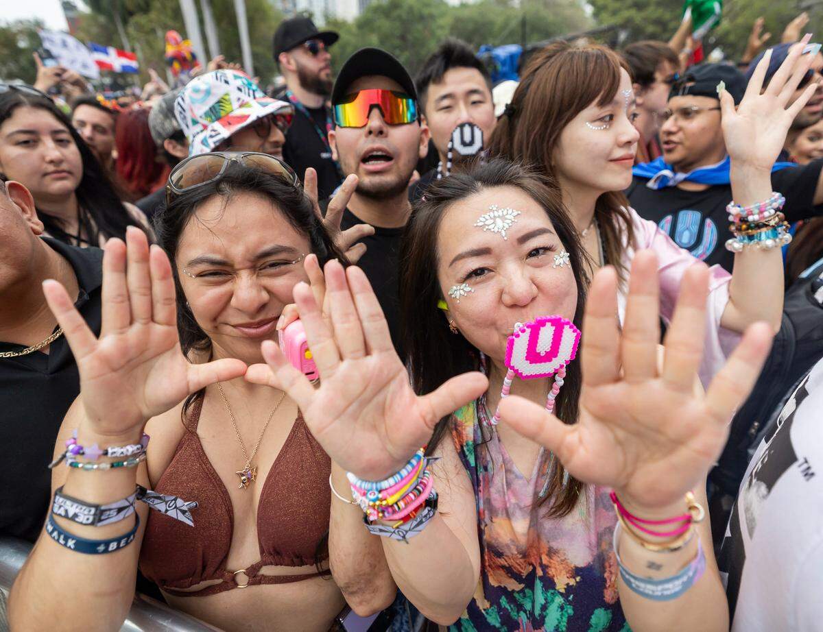 Michelle Padron Castro, left, and Annie Chow, dance as Armin van Buuren performs during Ultra Music Festival’s 25th anniversary at Bayfront Park on Saturday, March 29, 2025, in downtown Miami, Fla.
