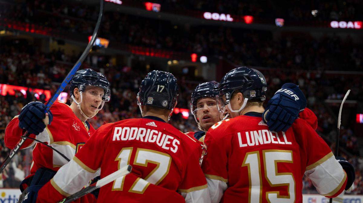 Panthers celebrate a goal by Florida Panthers center Anton Lundell (15) during the second period of a NHL game on Wednesday, Nov. 22, 2023, at Amerant Bank Arena in Sunrise, Fla.