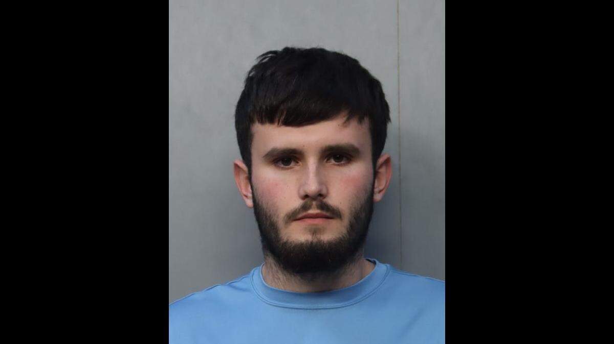 Julio Isidro, an after school camp coach at Robert King High Park, was charged with touching a 9-year-old boy twice, Miami-Dade Police said.
