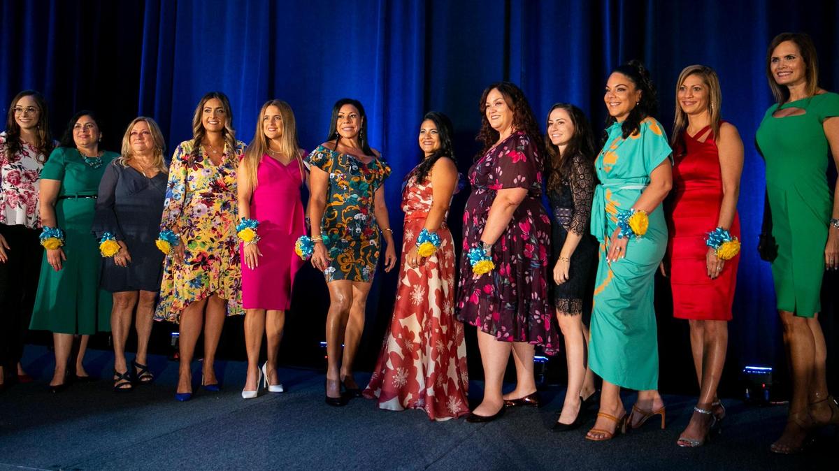 The 14 women who were honored during the 21st Hispanic Women of Distinction ceremony on Friday, Aug. 26, 2022, at the Signature Grand in Davie, Fla. The group honors HIspanic Women across South Florida.