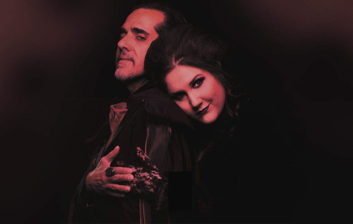 Lindsey Corey’s Mina cozies up to Carlos Orizondo’s Dracula in the Zoetic Stage world premiere of Michael McKeever’s “Dracula.”