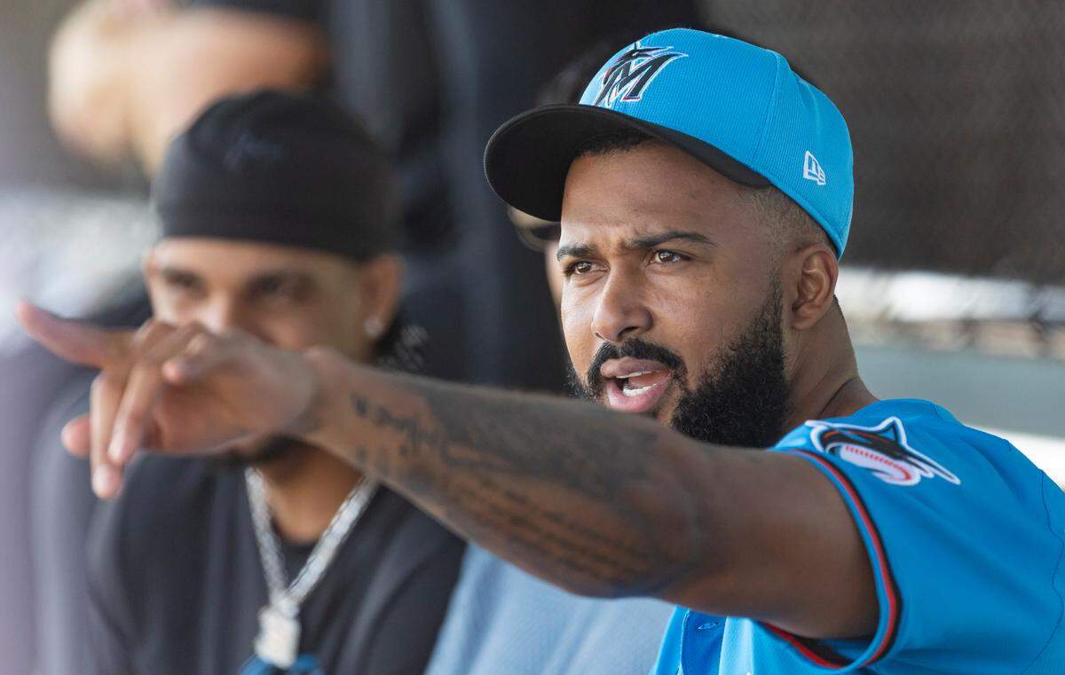 Miami Marlins pitcher Sandy Alcantara (22) reacts as he attends spring training workouts for pitchers and catchers at Roger Dean Chevrolet Stadium on Wednesday, Feb. 12, 2025, in Jupiter, Fla.