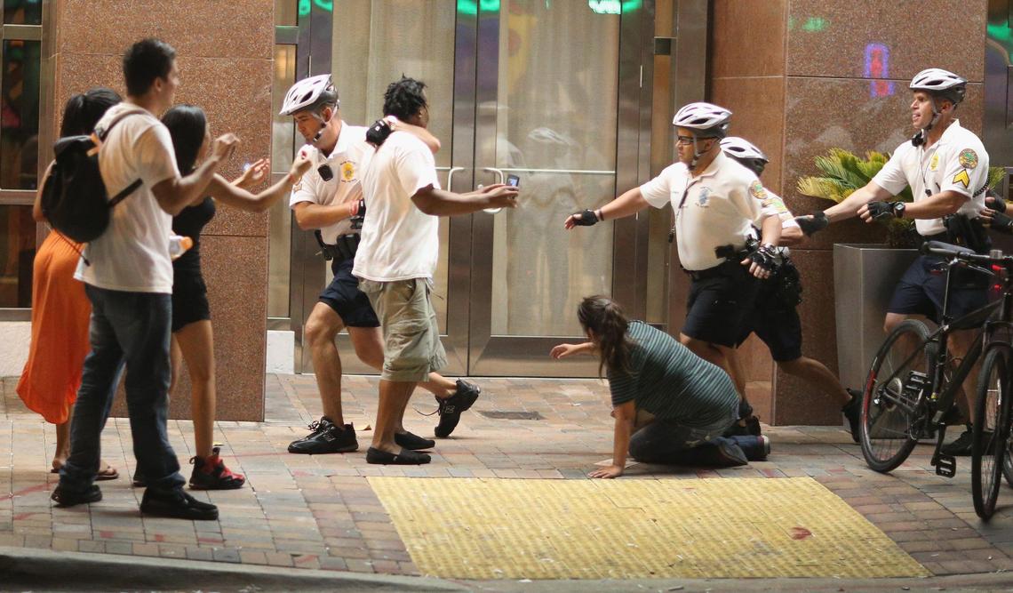 MIAMI, FL - JUNE 20: City of Miami Police attempt to clear a street of Miami Heat revellers celebrating their NBA title victory against the San Antonio Spurs on June 20, 2013 in Miami, Florida. The Heat have won back to back championships. (Photo by Joe Raedle/Getty Images)