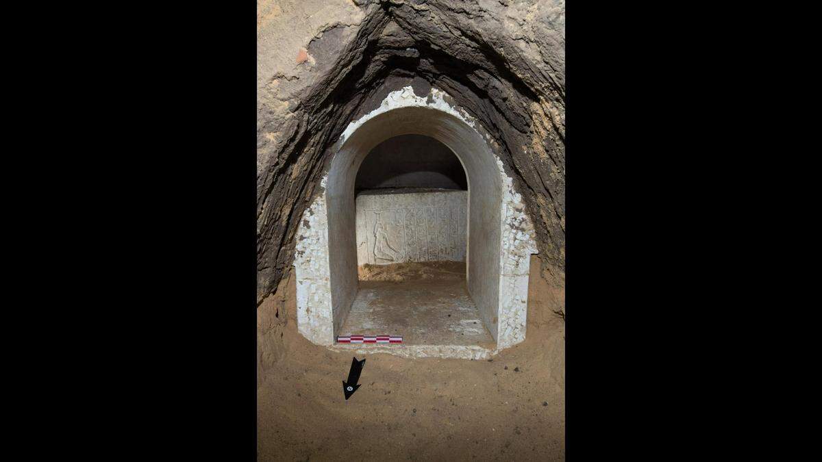 The burial was found beneath a well, officials said.