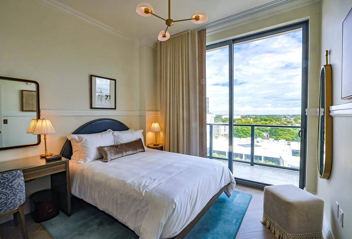 A bedroom in a model unit at NoMad Residences Wynwood.