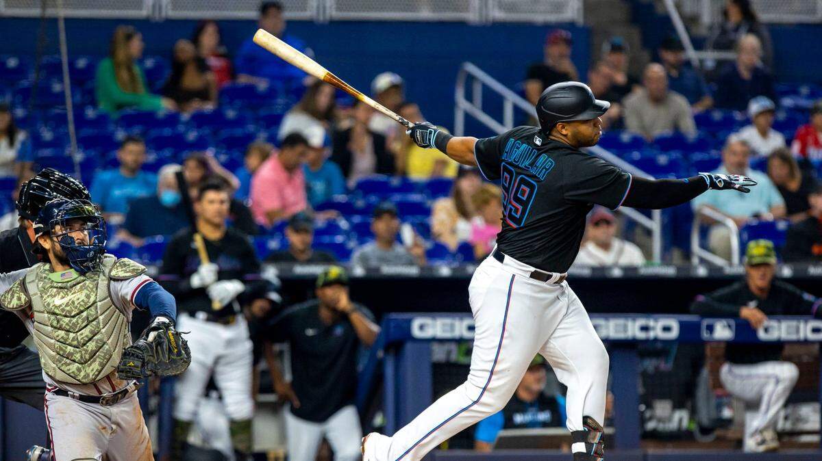 Miami Marlins batter Jesus Aguilar (99) strikes out swinging during the first inning of an MLB game against the Atlanta Braves at loanDepot park in the Little Havana neighborhood of Miami, Florida, on Friday, May 20, 2022.