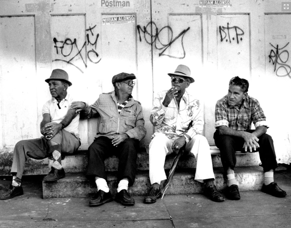 Roberto Conde, Jesus Rivero - Gattorno, Pascual Conde and Francisco Lopez are buddies and every morning they sit in the concrete steps waiting for lunch time at Little Havana Community Center. They talk politics, the Berlin wall, etc. - 1989
