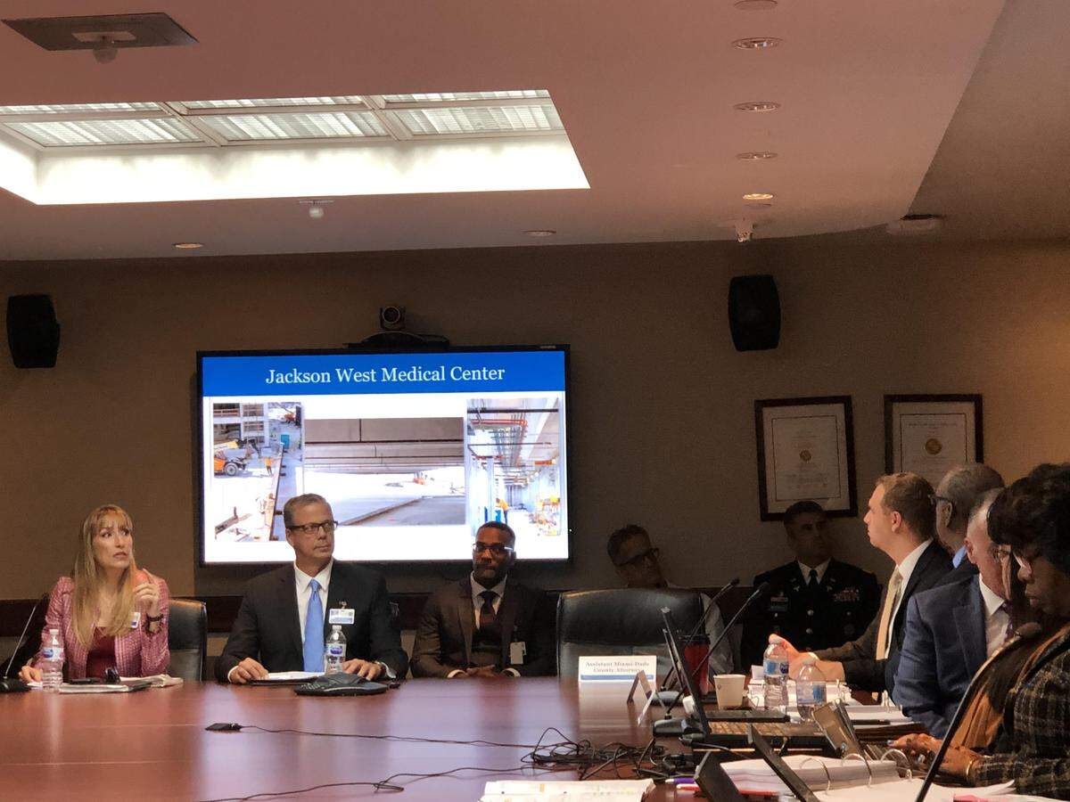 Isa Nunez, vice president of facilities, design and construction at Jackson Health System, updates the Public Health Trust on bond spending during a committee meeting at Jackson Memorial Hospital on October 30, 2019. The public health system has spent about $471.5 million since the bond program began.