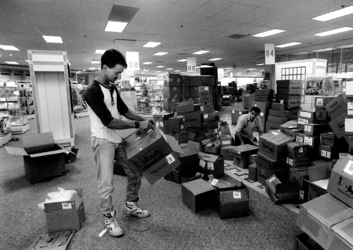 A Merwin’s employee moves boxes at the International Mall in West Miami-Dade in 1991.