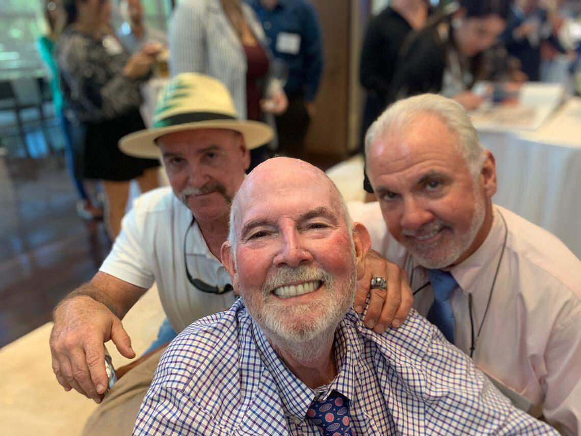 Chip Cassidy, center, with brothers Chris, left, and Desmond, right days before dying of esophageal cancer on Oct. 28.