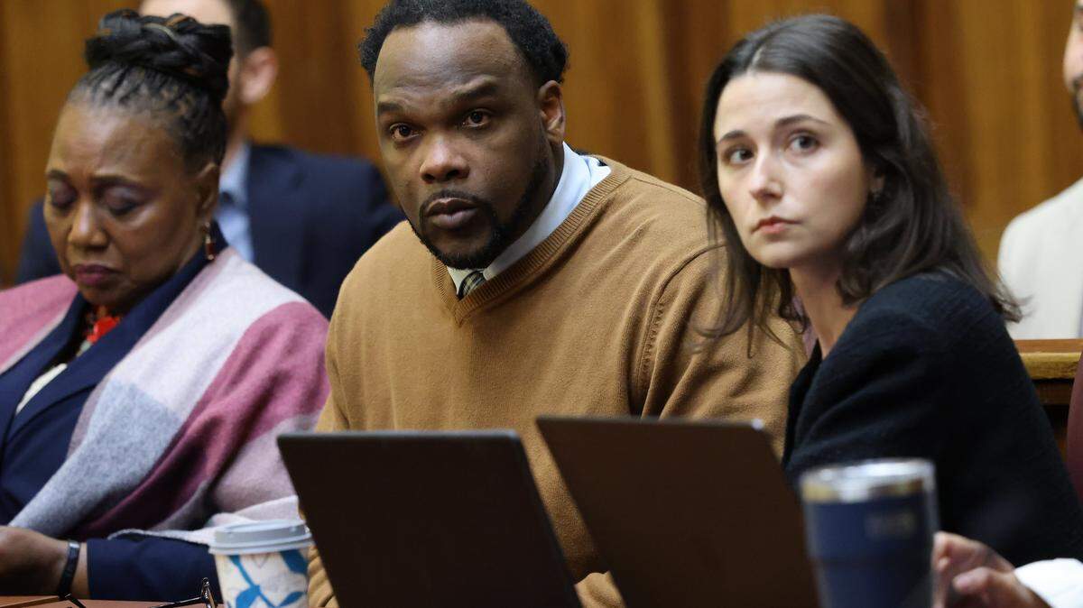POOL PHOTO: Rashaun Jones, who is accused of killing his University of Miami football teammate Bryan Pata in 2006, sits with defense attorneys in Judge Cristina Miranda Courtroom 4-1 at the Richard E. Gerstein Justice Building in Miami, FL, on Monday, March 2, 2026.