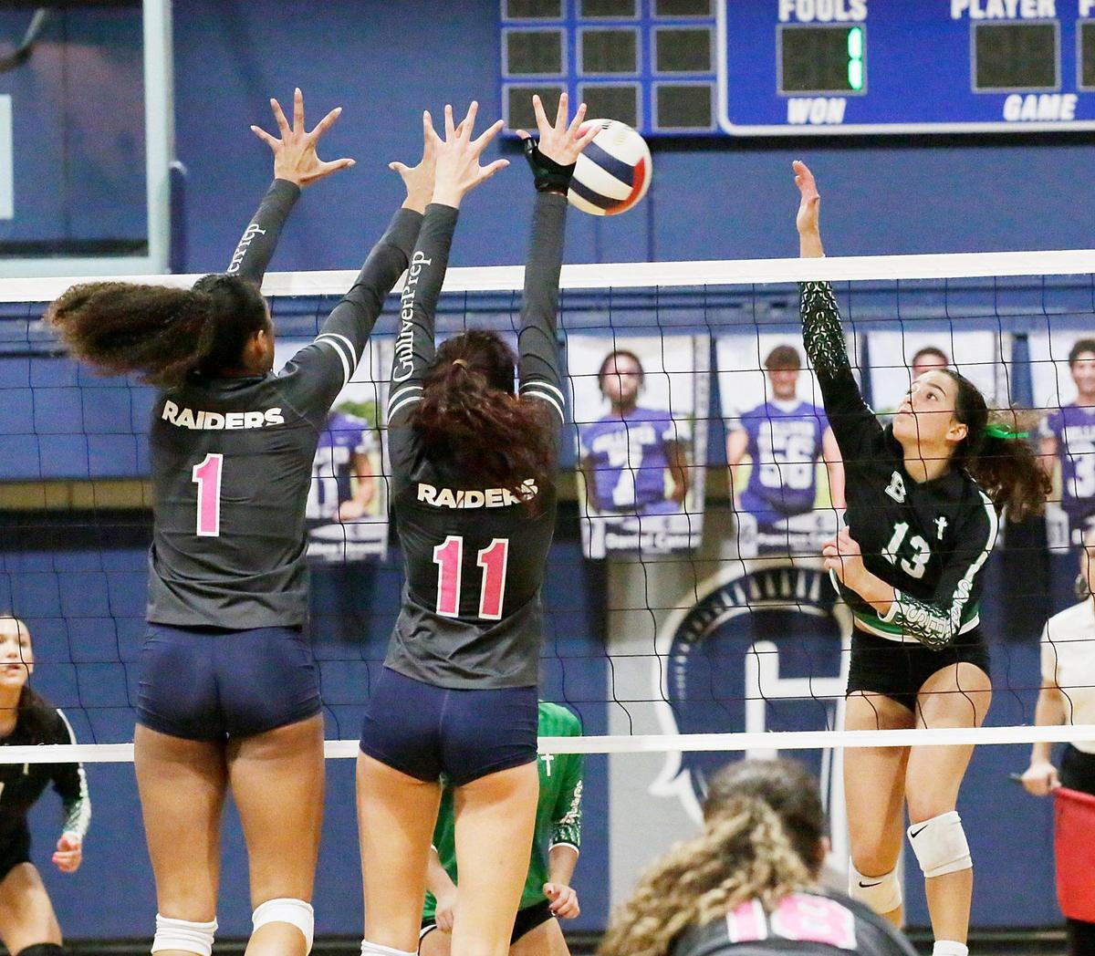 St. Brendan Annelise Alvarez (13) hits against Gulliver during regional volleyball final game on Tuesday, November 1, 2022 at Gulliver Prep in Miami. Andrew Uloza / for Miami Herald