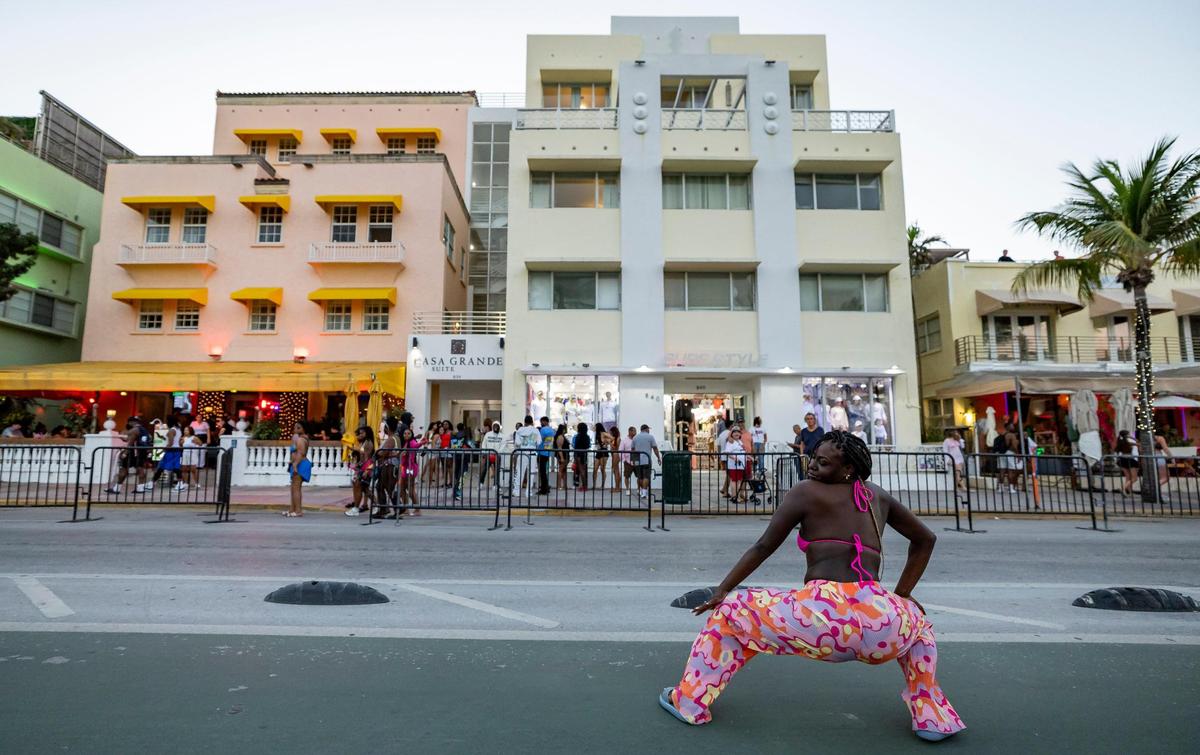 Mia Moreis twerks on Ocean Drive during spring break on Saturday, March 15, 2025, in Miami Beach, Fla.