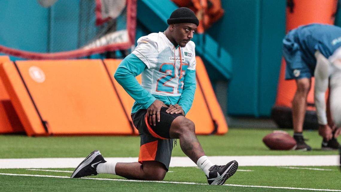 Miami Dolphins running back Duke Johnson (28) stretches before practice at Baptist Health Training Complex in Miami Gardens on Wednesday, October 27, 2021.