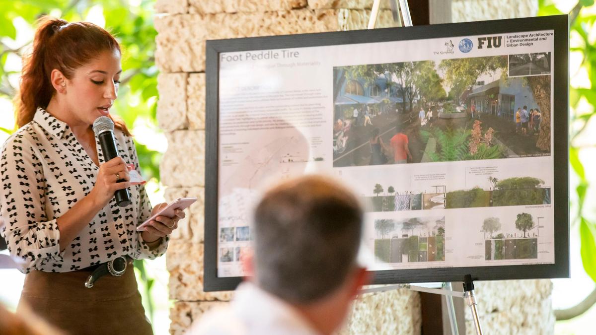 FIU landscape architecture graduate student Beatriz Alchalaby unveils her concept, ”Foot Peddle TIre,” for the proposed completion of the Commodore Trail, during a meeting held by Friends of the Commodore Trail at The Kampong in Miami on Tuesday, May 7, 2019.