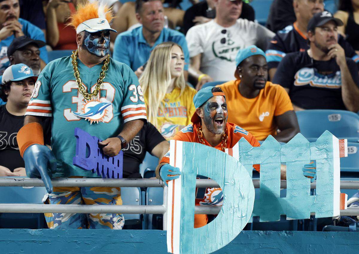 Miami Dolphins fans show their support during the NFL game against the New York Jets at Hard Rock Stadium in Miami Gardens, Florida, on Monday, September 29, 2025. 