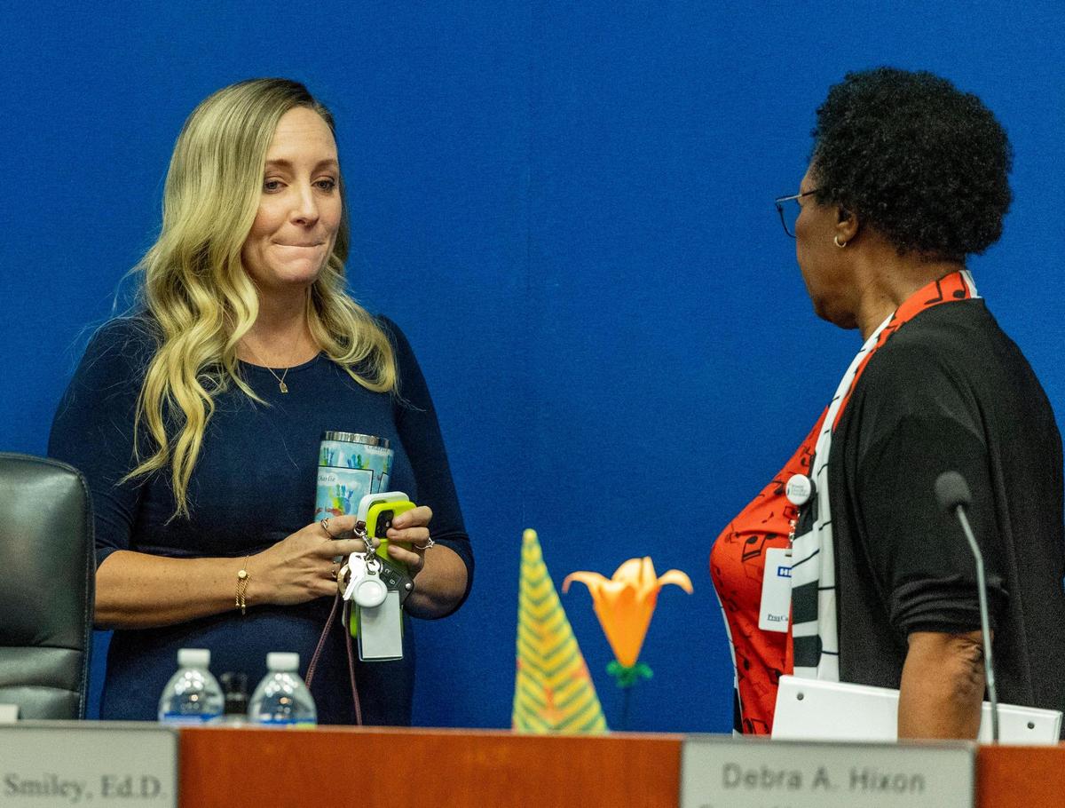 Fort Lauderdale, Florida - June 29, 2023 - Broward School Board members Sarah M. Leonardi, left and Interim Superintendent Dr. Earlean C. Smiley, right, talk after Dr. Smiley adjourned a special meeting of the Broward School Board because there was no quorum. The board was due to vote on the contract with the new superintendent.