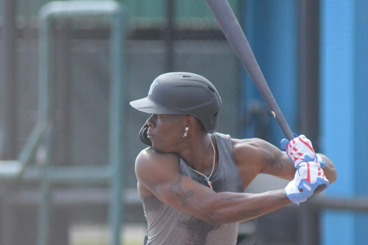 Miami Marlins center fielder Jazz Chisholm Jr. bats during a live batting practice session on Sunday, Feb. 19, 2023, at the Roger Dean Chevrolet Stadium complex in Jupiter, Florida.