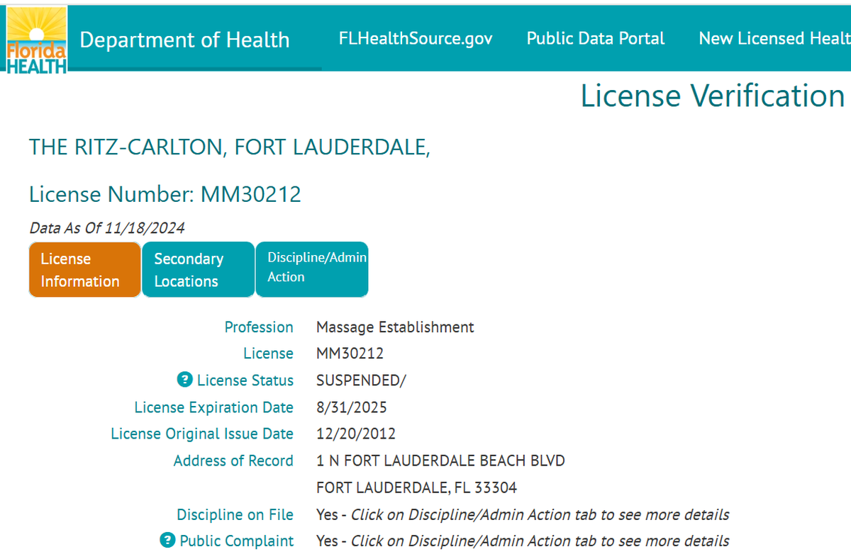 A Monday screen grab -- note the date beneath the license number -- of the Florida Department of Health’s profile page for the Ritz-Carlton Fort Lauderdale’s massage establishment license states the license is suspended.