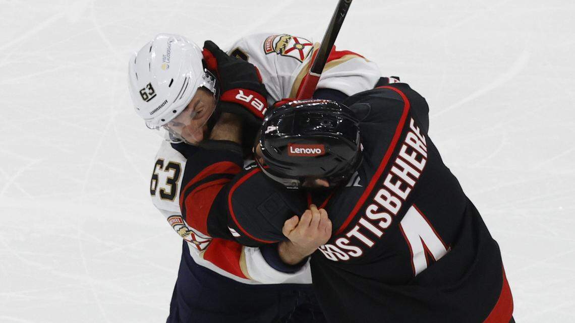Panthers’ Brad Marchand (63) tangles with Carolina’s Shayne Gostisbehere (4) during the third period of the Florida Panthers’ 5-2 victory over the Carolina Hurricanes in Game 1 of the Eastern Conference Finals at the Lenovo Center in Raleigh, N.C., Tuesday, May 20, 2025.