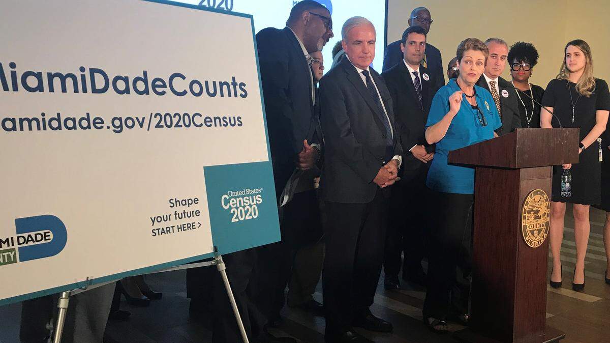 Miami-Dade Commissioner Rebeca Sosa speaks at a press conference Monday urging county residents to participate in the 2020 Census. The county opposes the Trump administration’s plan to add a citizenship question to the Census. To her right is Carlos Gimenez, mayor of Miami-Dade.