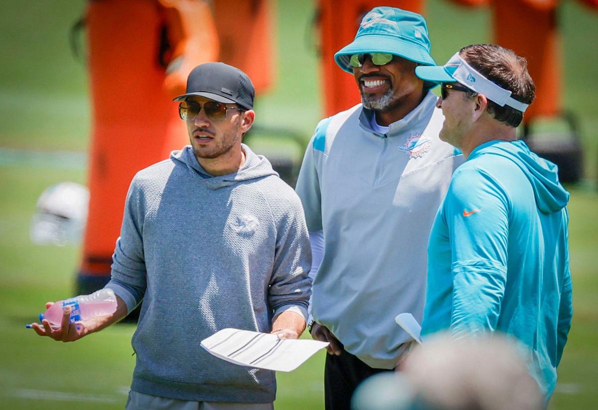 Left to right, Miami Dolphins coach Mike McDaniel stands with Defensive Coordinator Anthony Weaver and Linebackers Coach Joe Barry.