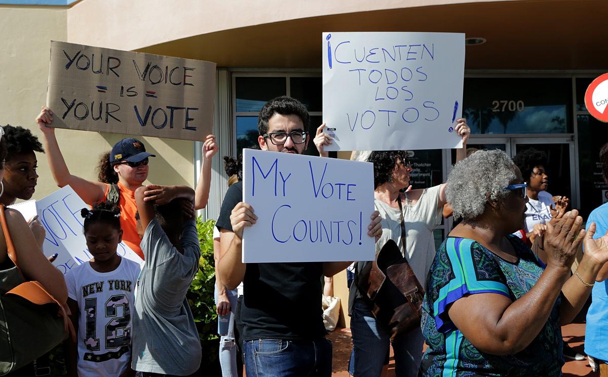 A group of activists protested in front of the Miami-Date Elections Department on Saturday November 10, 2018, demanding that all ballots be counted, included some found at an Opa-locka mail facility.