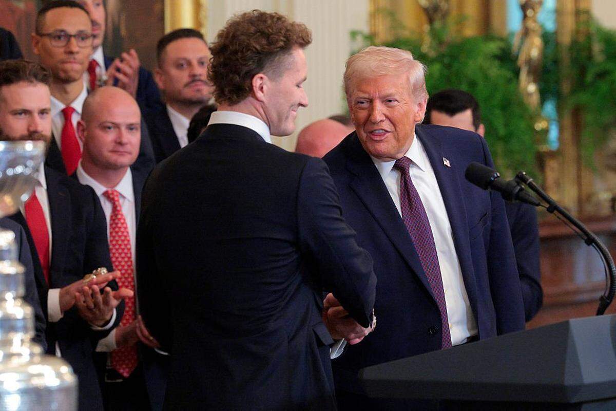 WASHINGTON, DC - JANUARY 15: U.S. President Donald Trump (R) shakes hands with Matthew Tkachuk of the Florida Panthers during a ceremony to honor the 2025 Stanley Cup Champion Florida Panthers in the East Room of the White House on January 15, 2026 in Washington, DC. The Florida Panthers defeated the Edmonton Oilers for the second straight year in their first-ever championships since joining the NHL in 1993. (Photo by Chip Somodevilla/Getty Images)