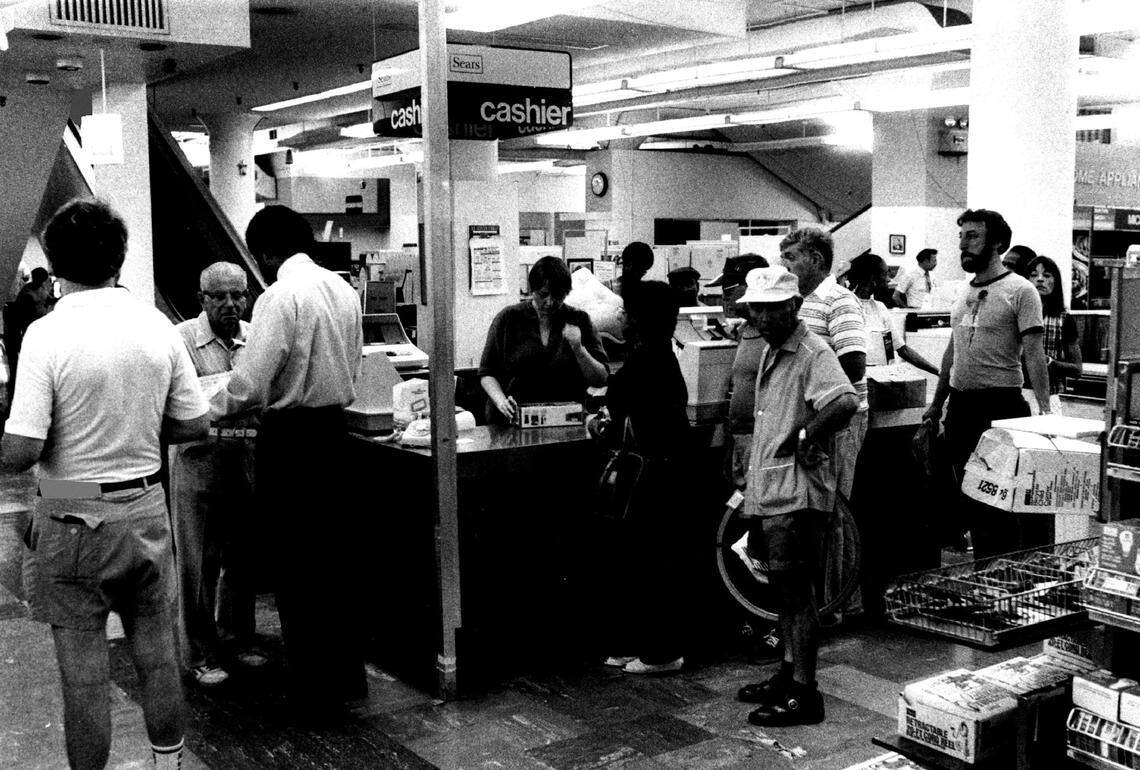 Clearance sale as the downtown Miami Sears store prepares to close in 1983.