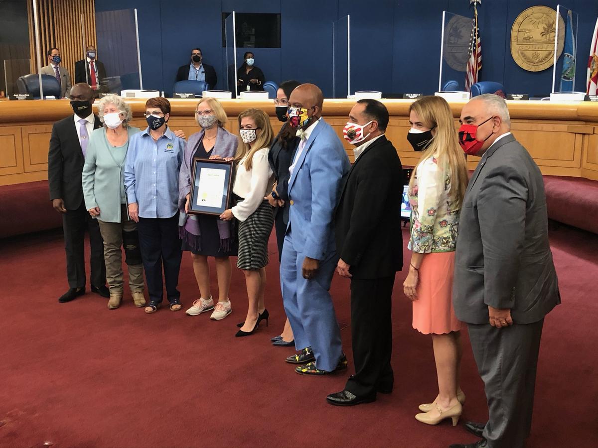 Commissioner Raquel Regalado, second from right, joins fellow commissioners and county administrators for a group photo on the evening of Tuesday, Jan. 9, 2021. Regalado tested positive for COVID Wednesday.