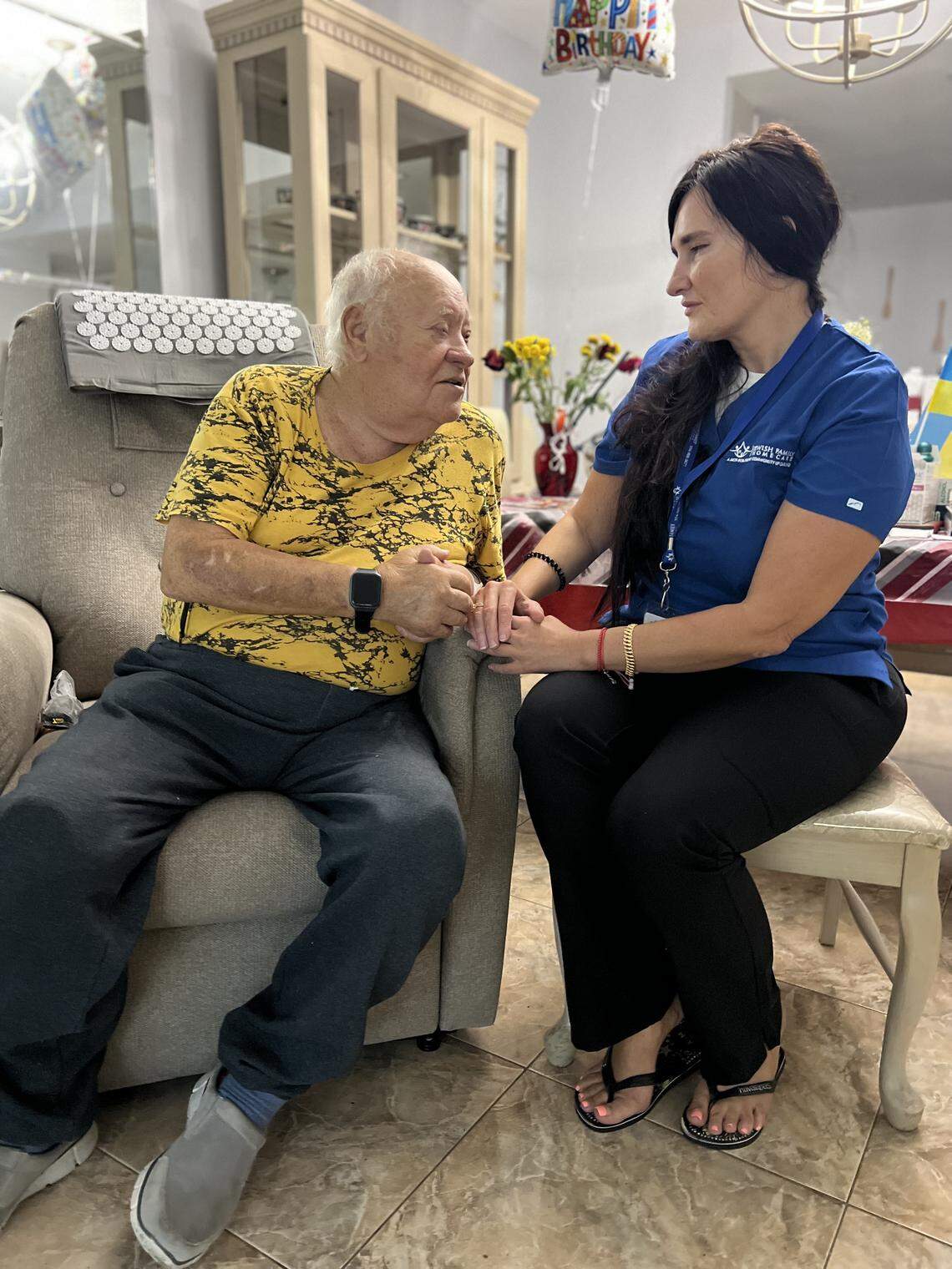 Avram Binder is checked on by Tatyana Virsta, a nurse with Jewish Family Home Care.