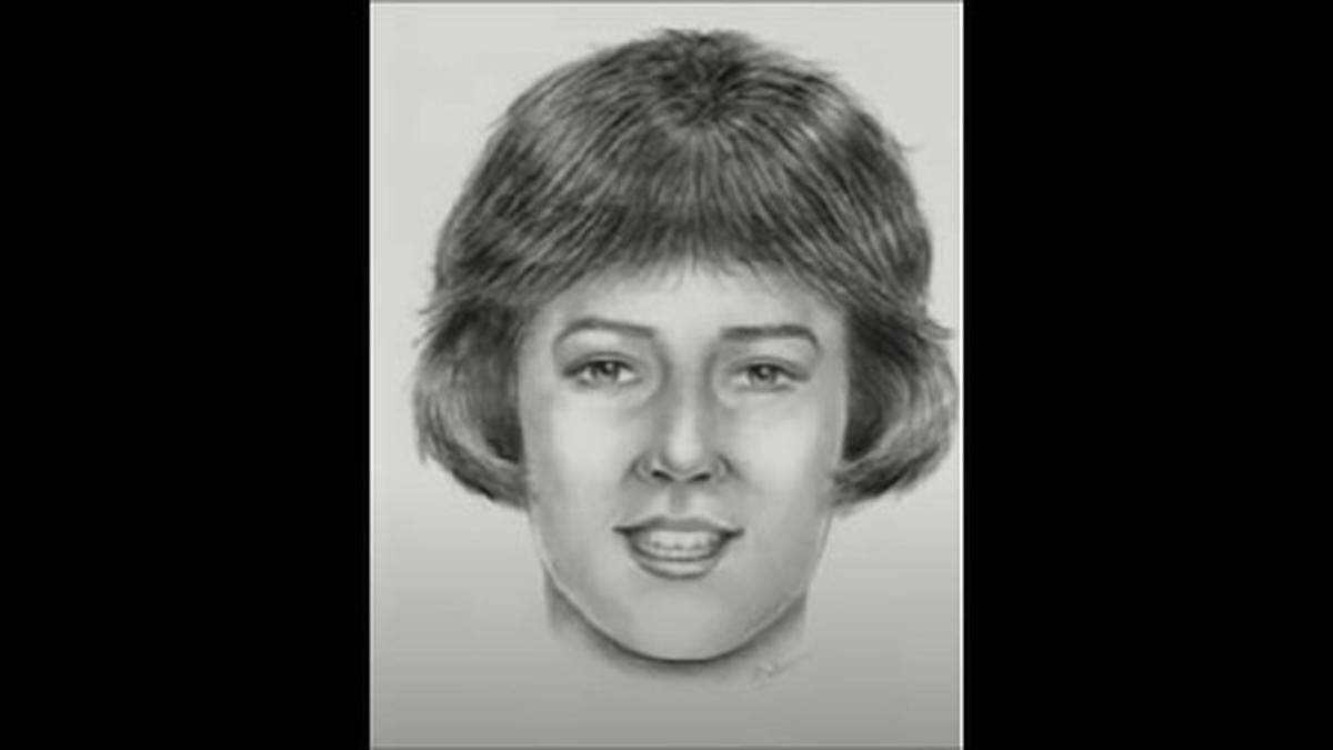 The woman was found wrapped in a blanket and with a men’s leather belt around her neck.