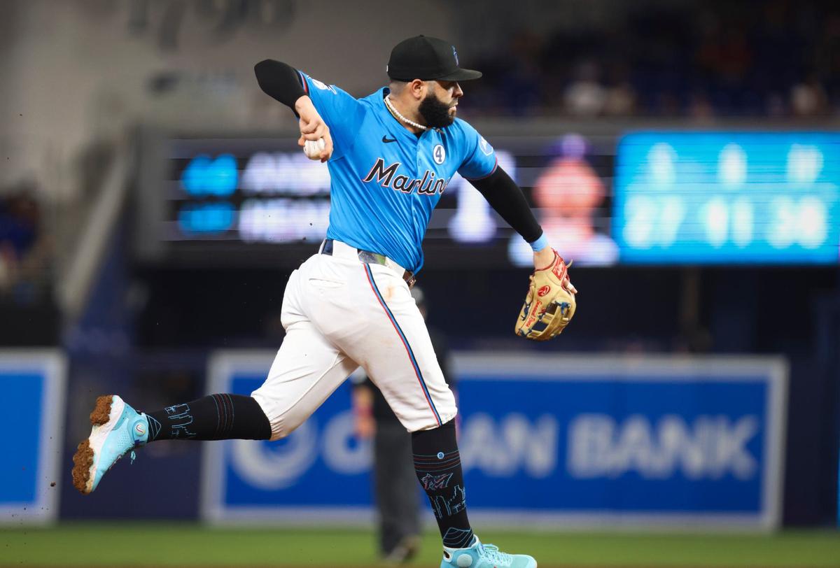 Miami Marlins third base Emmanuel Rivera (15) throws the ball after fielding it during the fourth inning of a baseball game on Sunday, June 2, 2024, at loanDepot Park in Miami.