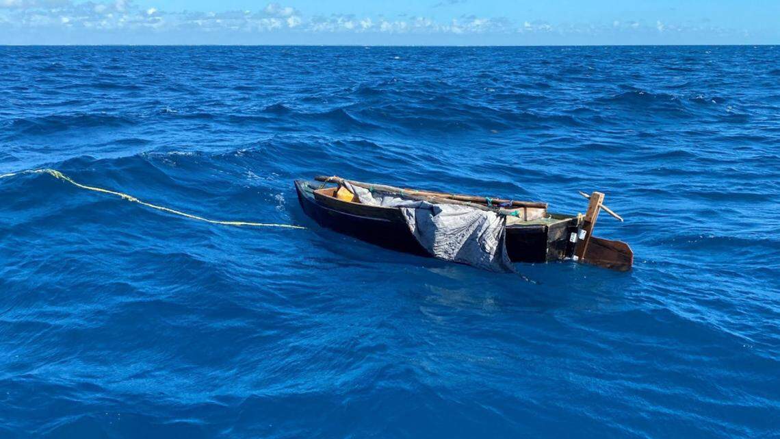 A small boat floats in the ocean off the Florida Keys Monday, March 1, 2021. Two men from Cuba were on the vessel before they were stopped by the U.S. Coast Guard.