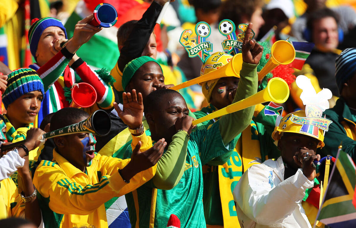 JOHANNESBURG, SOUTH AFRICA - JUNE 11:  South Africa fans blow Vuvuzela's ahead of the Opening Ceremony of the 2010 FIFA World Cup South Africa Group A match between South Africa and Mexico at Soccer City Stadium on June 11, 2010 in Johannesburg, South Africa.  (Photo by Clive Rose/Getty Images)